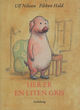 Omslagsbilde:Her er en liten gris : en hel roman